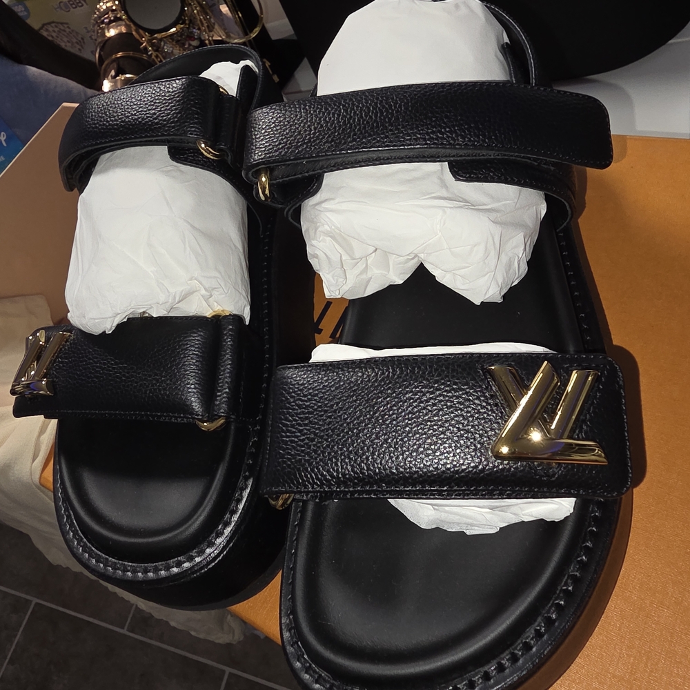 Louis Vuitton Black Sandals with Gold Accents